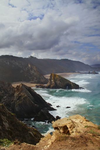 A vertical shot of amazing cliffs of Loiba located in Lugo, Galicia during the day