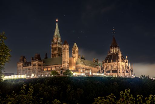 A long exposure shot after a fireworks show of parliament hill at night in Downtown Ottawa