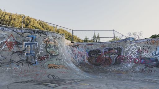 A beautiful shot of a skate park covered in graffiti