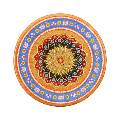 A top view of an oriental ceramic plate with a floral pattern on a white background, Uzbekistan, Tashkent
