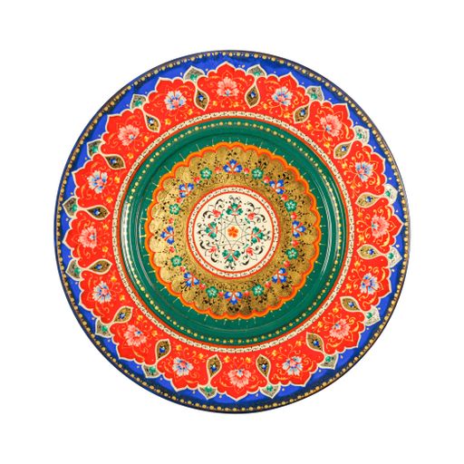A top view of an oriental ceramic plate with a floral pattern on a white background, Uzbekistan, Tashkent