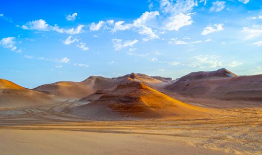 A scenic view of Sand Dunes in Shipwreck Beach, United Arab Emirates