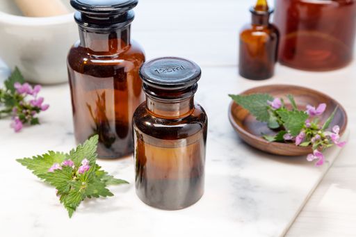 Nettle essential oil isolated still life. Herbal remedies