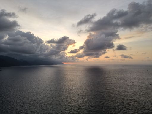 A beautiful shot of a calm seascape under a cloudy sky
