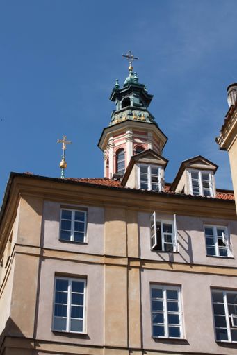 A vertical shot of the historical Jesuit church in downtown Warsaw, Poland
