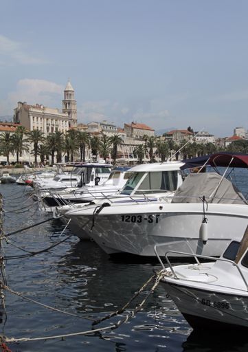 Split, Croatia - 14 Au 2019: Rows of boats and yachts along the boulevard in Split, Croatia.