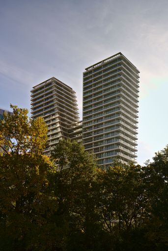A vertical shot of tall buildings in Prague on a sunny day, Czech Republic