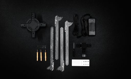 A top view of the parts and details of a computer on black surface