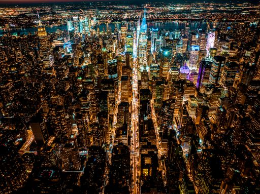 An aerial night cityscape view of New York, United States
