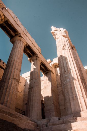 The vertical shot of the Parthenon temple ruins