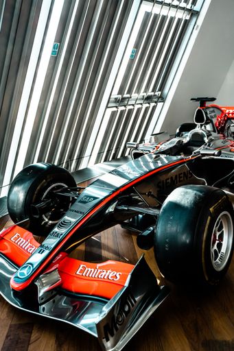 A closeup of the McLaren MP4-22 racing car at the Mercedes Benz World