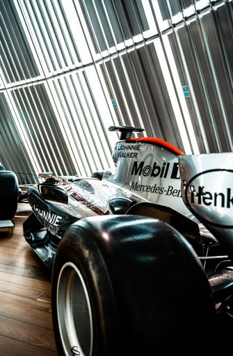 A closeup of the McLaren MP4-22 racing car at the Mercedes Benz World