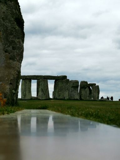 A beautiful shot of Stonehenge under cloudy sky