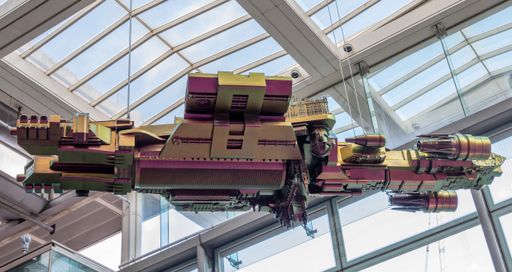 The HMS Alice Liddell spaceship sculpture hanging from the roof of St Pancras Station, London.