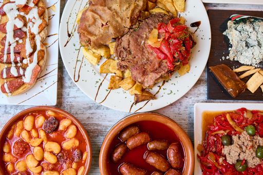 A top view of variety of delicious dishes on the table