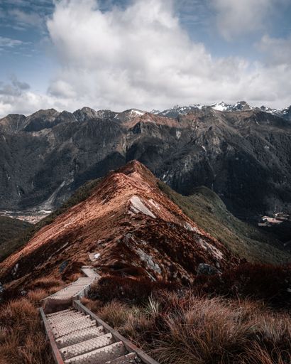 A vertical shot of the hiking trail of Kepler Track in New Zealand