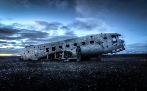 The wreck of a US Naval DC-3 aircraft forced to make an emergency landing sits abandoned on Iceland's Solheimasandur Beach.