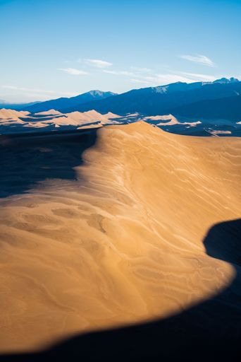 An aerial view of desert with sandy hills in Great Sand Dunes National Park