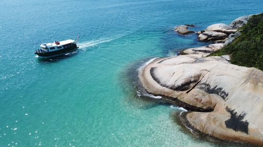 A beautiful view of a boat near the beach.