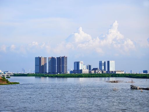 a line of skyscrapers in the reclaimed beach area of Pantai Indah Kapuk, North Jakarta