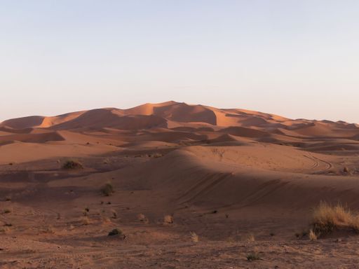 A scenic view of the Sahara desert under the clear sky, Morocco