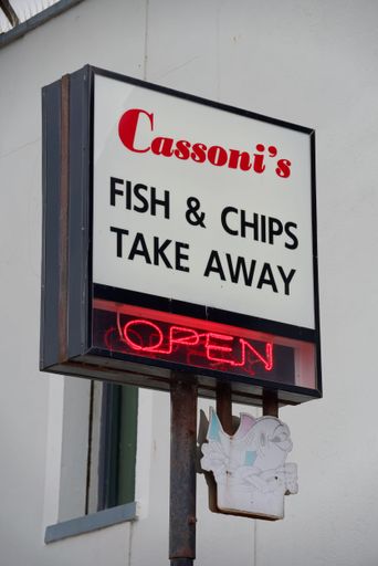 Logo of the Cassoni's fish and chips take away restaurant in Bray, County Wicklow, Ireland. Vertical photo.