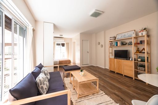 A cozy shot of living room with wooden furniture