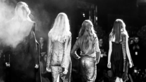 Fashion Show, Catwalk event themed photograph, runway show shot from the audience, blurred on purpose