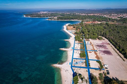 An aerial view of the Beach Hidrobaza on a sunny day in  Pula, Croatia
