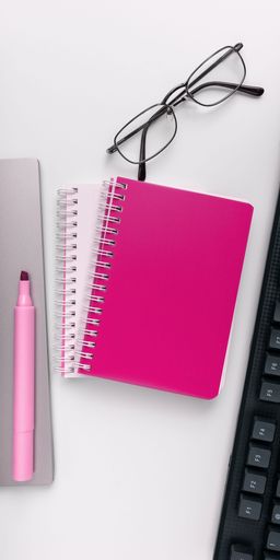 Office Supplies Over Desk With Keyboard And Glasses And Coffee Cup For Working