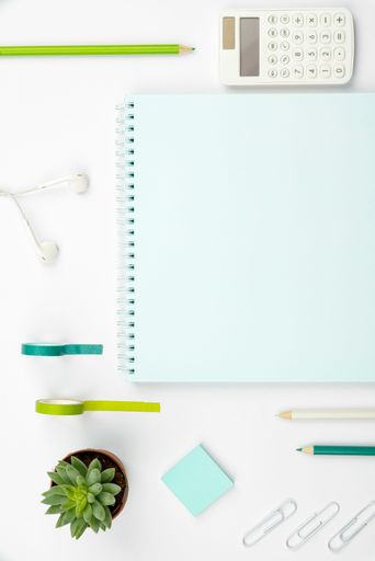 Office Supplies Over Desk With Keyboard And Glasses And Coffee Cup For Working