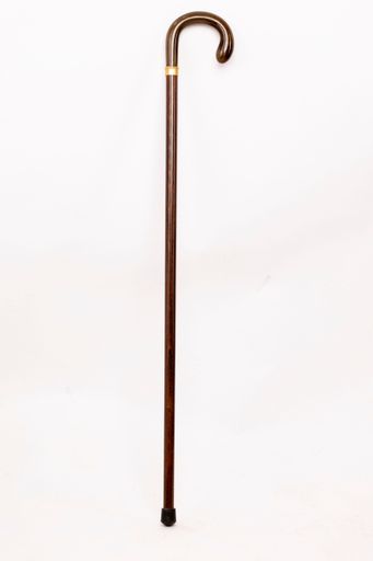 A vertical shot of a cherry acacia wooden walking stick cane with collar isolated on white background