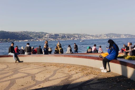 A view of people resting in the park in Beylerbeyi, Istanbul, Turkey