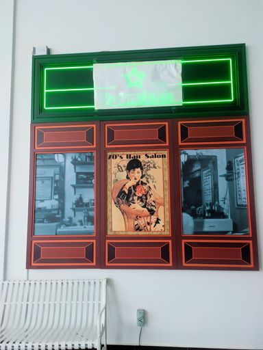 A vintage 70s hair salon banner in Malaysia