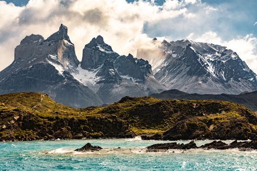 A scenic view of the Paine horns and the lake of the Torres del Paine National park in Patagonia, Chile