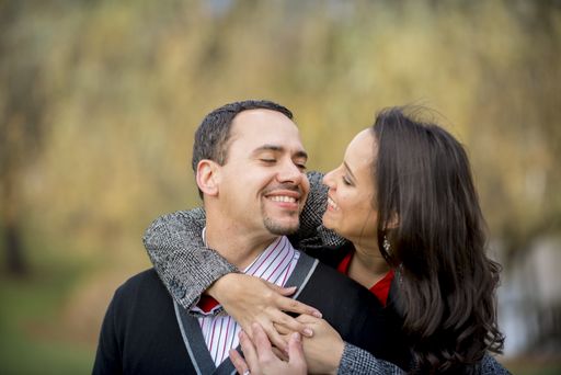 A shallow focus shot of a couple in love smiling at each other