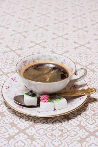 A high angle shot of a coffee cup on the table