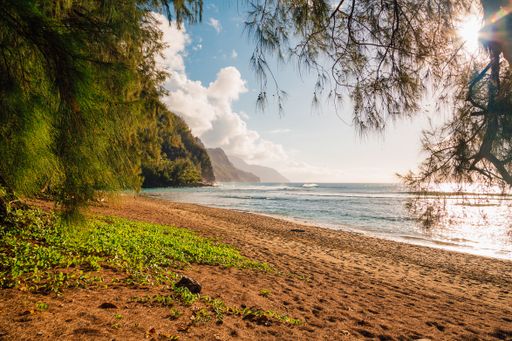 A beautiful shot of the sunset at the beach on the island of Kauai near Na Pali cliffs