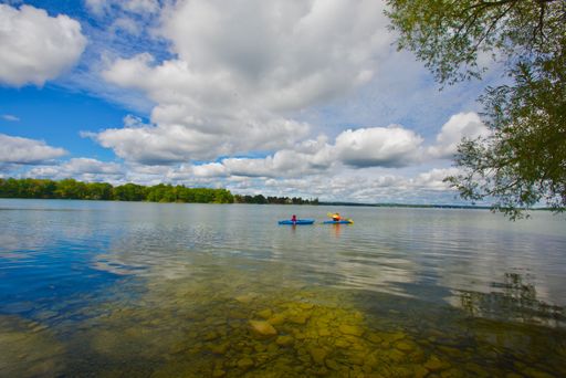 A person kayaking on the lake