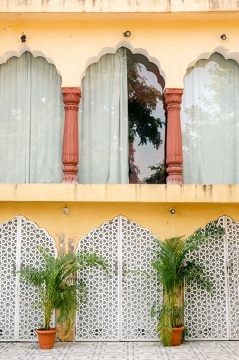 yellow windows with flowers in india