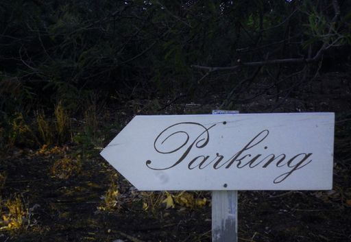 An informative board of the address in which the Parking is located