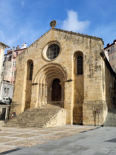 A low-angle view of an ancient building on a sunny day