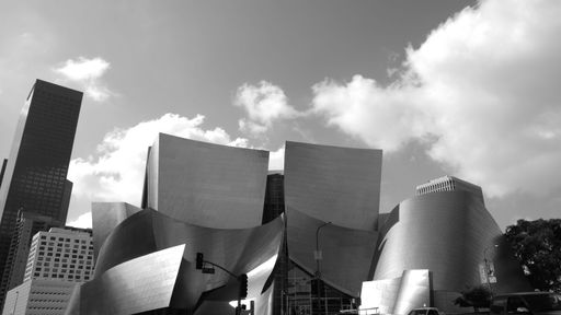 A grayscale shot of the exterior of Walt Disney Concert Hall in Los Angeles, California