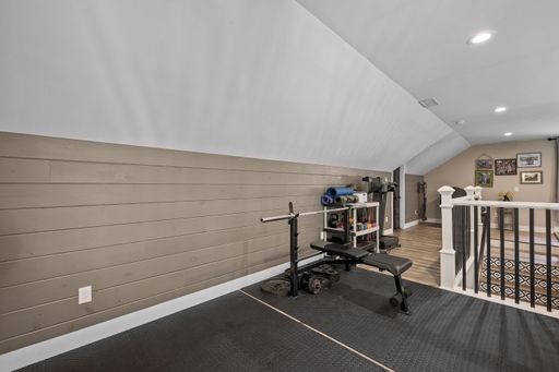 A home gym set-up on the second floor of a modern new England colonial home