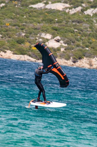 PORTO POLLO - ITALY - APRIL 24, 2020: Wing Foil activities on the SEA FROT MADDALENA ISLAND PORTO POLLO