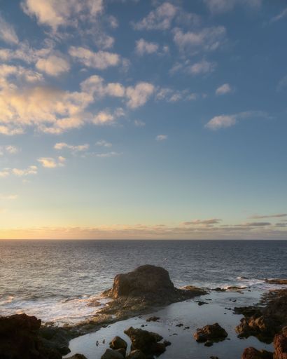 A vertical shot of sunset over the sea in Gran Canaria, Canary Islands, Spain