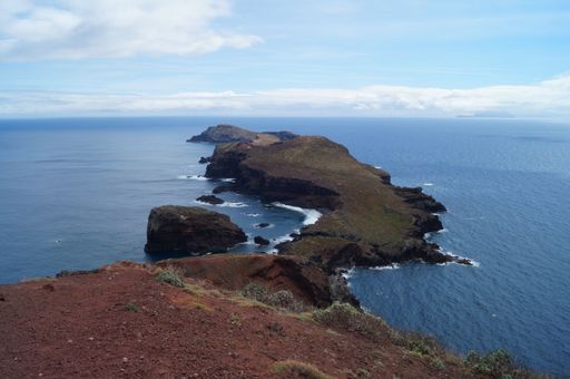 The big island in Ponta de Sao Lourenco, Madeira surrounded by the calm ocean under the blue sky