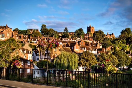 A scenic view of Bridgnorth town with church on top of a green hill in England, UK