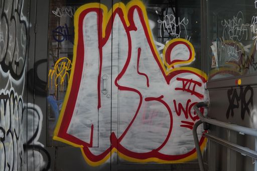 A closeup of graffiti on the wall of one of the corners in Soho, New York City