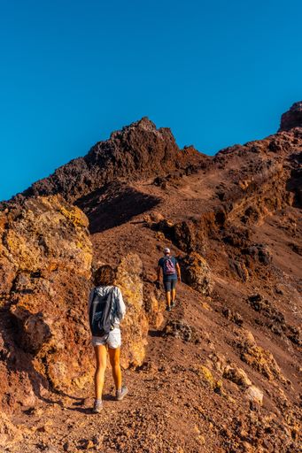 A female exploring Teneguia volcano on the island of La Palma, Canary Islands, Spain